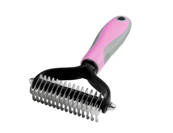Cepillo para mascotas rosado